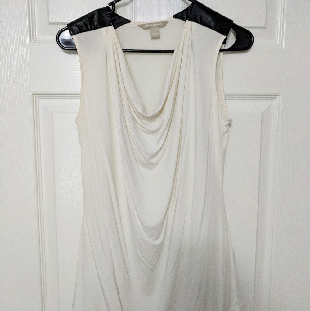 Sleevless top with leather accent